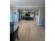 Open floor plan showcases the living room with a fireplace, seamlessly connected to the kitchen at 2030 Hydrangea Ln, Austell, GA 30106