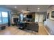Spacious living room features a fireplace, a ceiling fan and large windows at 2030 Hydrangea Ln, Austell, GA 30106