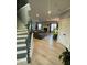 Open-concept living room boasts lots of natural light and flows into the dining area at 2030 Hydrangea Ln, Austell, GA 30106