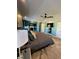 Beautifully designed bedroom with gray color scheme, tray ceiling, and access to living area at 2030 Hydrangea Ln, Austell, GA 30106