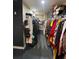 Organized walk-in closet featuring ample storage space and shelving for clothing at 2030 Hydrangea Ln, Austell, GA 30106