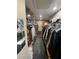 Organized walk-in closet featuring ample storage space and shelving for clothing at 2030 Hydrangea Ln, Austell, GA 30106