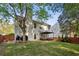 Two-story home with deck, backyard, and mature trees at 2332 Leacroft Way, Marietta, GA 30062