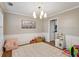 Traditional dining room with wainscoting, chandelier, and neutral paint at 2332 Leacroft Way, Marietta, GA 30062