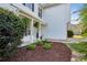 Landscaped front yard featuring mulch, decorative rocks and greenery at 2332 Leacroft Way, Marietta, GA 30062