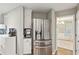 Bright area featuring stainless steel refrigerator and kitchen appliances at 2332 Leacroft Way, Marietta, GA 30062