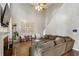 Living room with a fireplace, high ceiling and modern decor at 2332 Leacroft Way, Marietta, GA 30062