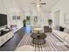 Bright living room with ample natural light, stylish furnishings, and modern flooring at 294 Farm Ridge Ne Dr, Woodstock, GA 30188