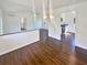 Living space with hardwood flooring and natural lighting, conveniently connected to the kitchen at 294 Farm Ridge Ne Dr, Woodstock, GA 30188