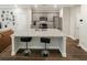 Modern kitchen with stainless steel appliances and large island at 3407 Hidden Stream Ct, Stockbridge, GA 30281