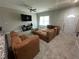 Comfortable living room with plush seating and neutral decor at 3407 Hidden Stream Ct, Stockbridge, GA 30281