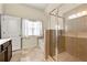 Main bathroom featuring tub, shower, and neutral tile floor at 517 Dasheill Ln, Atlanta, GA 30349