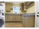 Bright, efficient kitchen featuring modern appliances, granite countertops, and ample cabinet space at 1083 Grace Dr, Forest Park, GA 30297
