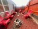 Relaxing backyard featuring a fire pit surrounded by comfortable Adirondack chairs at 1298 Gideons Sw Dr, Atlanta, GA 30314