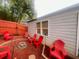 Inviting backyard with Adirondack chairs placed around a cozy fire pit at 1298 Gideons Sw Dr, Atlanta, GA 30314