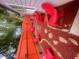 Backyard featuring a fire pit with red Adirondack chairs at 1298 Gideons Sw Dr, Atlanta, GA 30314