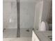 Bright bathroom featuring stylish marble tiles, a bathtub, and a modern toilet at 1298 Gideons Sw Dr, Atlanta, GA 30314