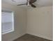 Neutral bedroom with a ceiling fan, window with blinds, and wood-look flooring at 1298 Gideons Sw Dr, Atlanta, GA 30314