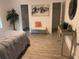 Bedroom with decorative tree, bench, artwork and neutral decor at 1298 Gideons Sw Dr, Atlanta, GA 30314