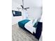 Modern bedroom with a comfortable bed, TV, and ample space for relaxation and rest at 1298 Gideons Sw Dr, Atlanta, GA 30314