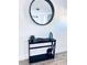 Welcoming entryway area with a stylish table, decorative mirror, and tasteful decor setting a warm tone at 1298 Gideons Sw Dr, Atlanta, GA 30314