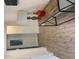 Entryway with a modern wood accent table and sleek flooring at 1298 Gideons Sw Dr, Atlanta, GA 30314