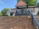 Charming home featuring a lovely covered porch and nicely landscaped yard with mature trees at 1298 Gideons Sw Dr, Atlanta, GA 30314