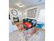 Bright living room features modern decor, wood-look flooring, and a comfortable seating area at 1298 Gideons Sw Dr, Atlanta, GA 30314