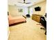 Neutral bedroom with a ceiling fan, flat screen TV, and wood furniture at 2870 Willow Wisp Way, Cumming, GA 30040