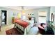 View of bedroom with ceiling fan, a double bed, windows with shades, a dresser and decor at 2870 Willow Wisp Way, Cumming, GA 30040