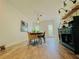 Bright dining room featuring wood floors, modern lighting, and open shelving at 2870 Willow Wisp Way, Cumming, GA 30040