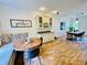 Dining room featuring a built-in bench, unique table, and stylish decor at 2870 Willow Wisp Way, Cumming, GA 30040