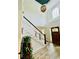 Spacious foyer with beautiful hardwood floors, high ceilings, and a stylish pendant light at 2870 Willow Wisp Way, Cumming, GA 30040