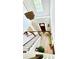 Staircase and foyer showcasing hardwood floors, modern lighting, and a view of the entry door at 2870 Willow Wisp Way, Cumming, GA 30040