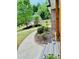 Landscaped front yard and a winding walkway leading to the house, surrounded by lush greenery at 2870 Willow Wisp Way, Cumming, GA 30040