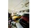 Spacious garage with ample storage and room for multiple vehicles, showcasing potential for car enthusiasts at 2870 Willow Wisp Way, Cumming, GA 30040