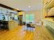 Charming kitchen featuring exposed beams, a breakfast nook, stainless steel appliances, and granite counters at 2870 Willow Wisp Way, Cumming, GA 30040