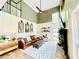 Cozy living room featuring high ceilings, a fireplace with greenery, and comfortable seating at 2870 Willow Wisp Way, Cumming, GA 30040