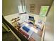 Bright living room boasts soaring ceilings, a cozy fireplace, ample natural light, and stylish, comfortable furnishings at 2870 Willow Wisp Way, Cumming, GA 30040