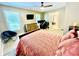 Spacious main bedroom with ceiling fan, lots of natural light and a sitting area with a view at 2870 Willow Wisp Way, Cumming, GA 30040