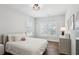 Bright bedroom features wood floors, white walls, and plantation shutters at 2977 Treeside Ter, Marietta, GA 30066