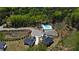 Aerial view features community pool with modern farmhouse-style homes in the background at 2977 Treeside Ter, Marietta, GA 30066
