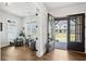 Bright foyer with hardwood floors, open views, and a glimpse of the front yard at 2977 Treeside Ter, Marietta, GA 30066