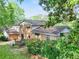 Two-story brick home with a large backyard and mature trees providing ample shade at 3844 Lake Se Dr, Smyrna, GA 30082