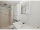Bathroom featuring a shower, toilet, sink with storage above and below the marble top at 3844 Lake Se Dr, Smyrna, GA 30082
