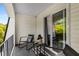 The covered balcony has views of the sky and landscaping at 5250 Chemin De Vie, Atlanta, GA 30342