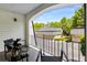 Serene balcony with seating offers neighborhood views and sunlight at 5250 Chemin De Vie, Atlanta, GA 30342