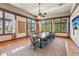 Elegant conference room with a large table, ample natural light, and modern amenities for productive meetings at 6103 Menlow Ct, Cumming, GA 30041