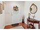 Inviting entryway with hardwood floors, elegant decor, and a welcoming ambiance at 6103 Menlow Ct, Cumming, GA 30041
