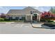 Charming lodge exterior with a well-manicured lawn and convenient parking, displaying welcoming signage at 6103 Menlow Ct, Cumming, GA 30041